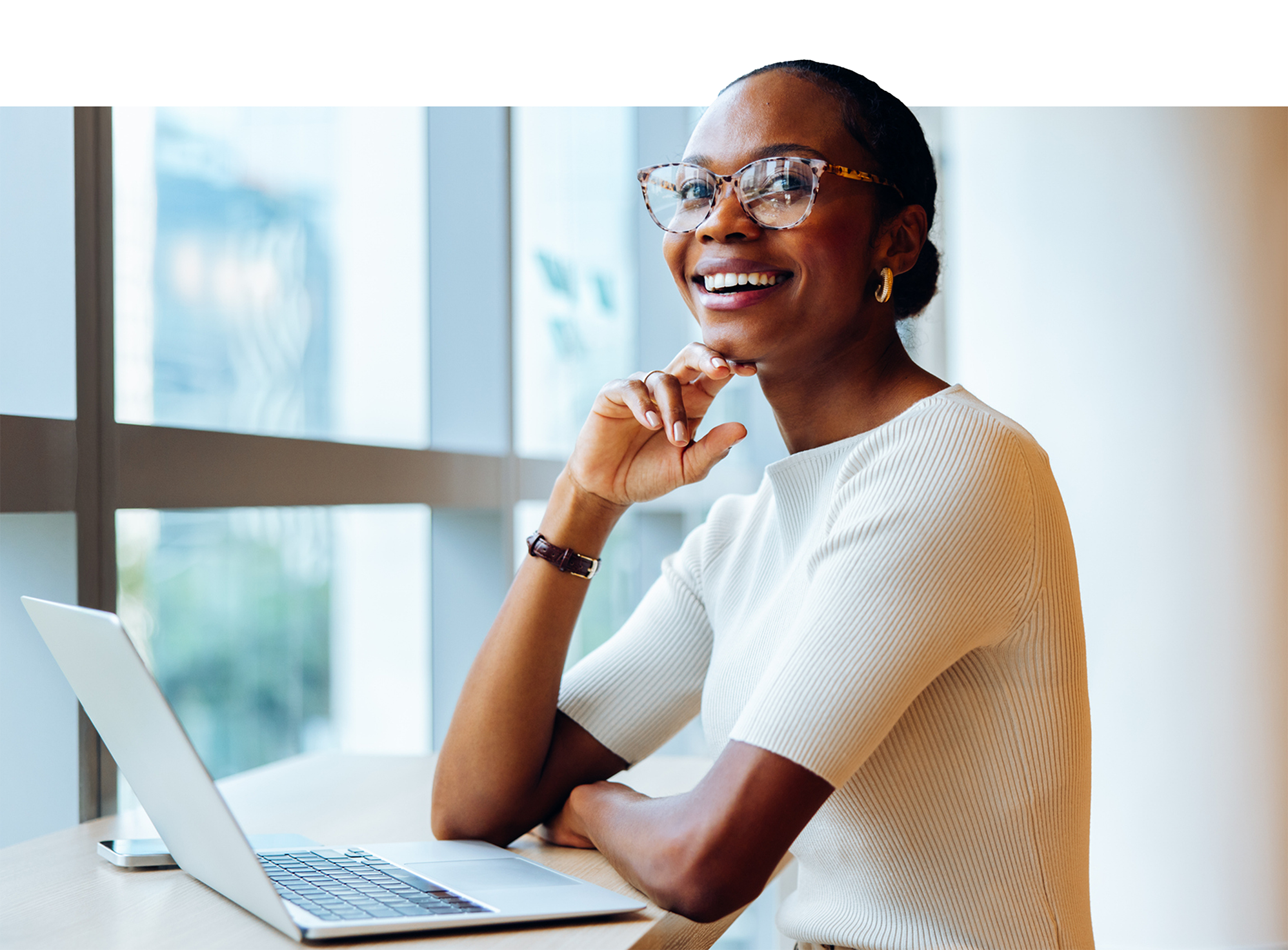 Employee experience leader working at a laptop